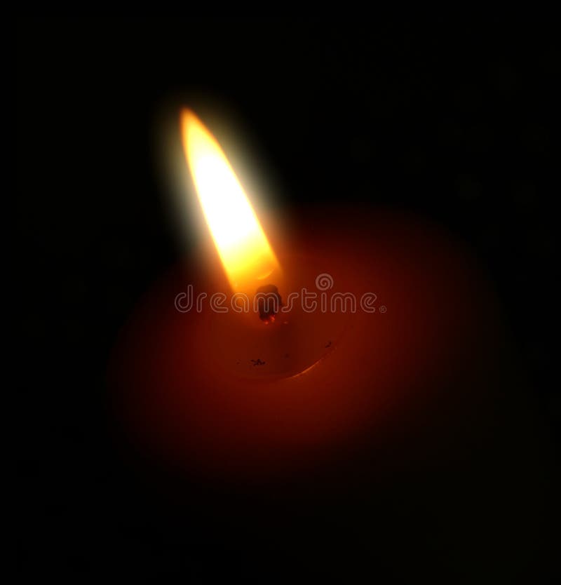 Burning candle over black stock photo. Image of christmas 31787900