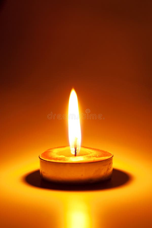 Burning candle stock photo