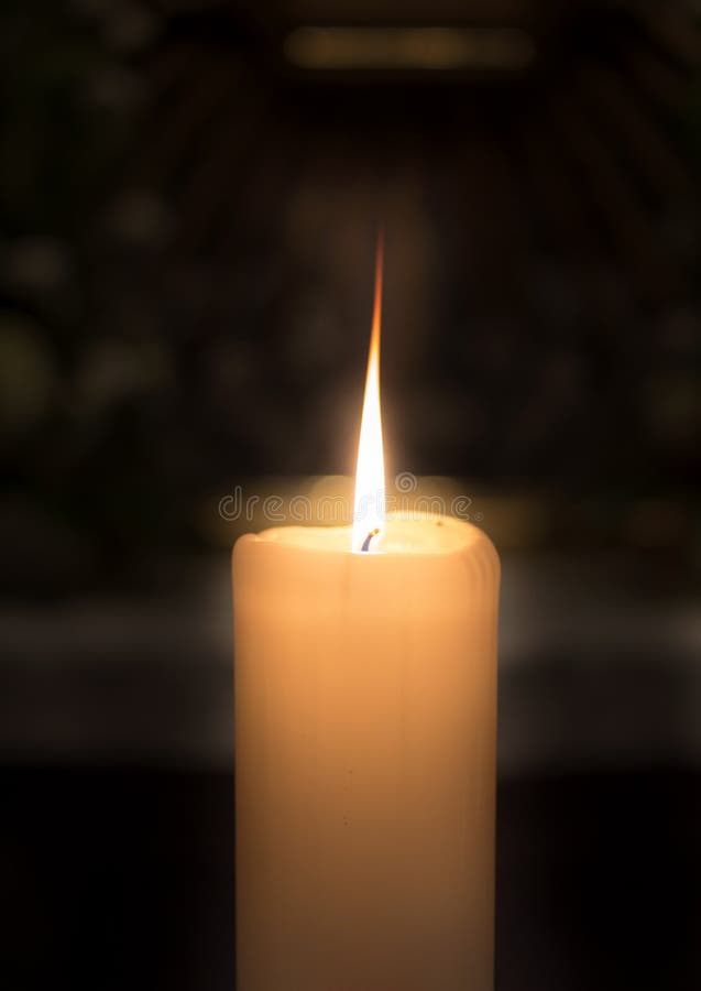 Burning candle on dark stock photo. Image of alone, candlelight 60793552