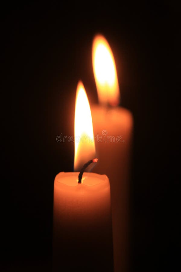 Burning candle in the dark stock image. Image of candle 83161777