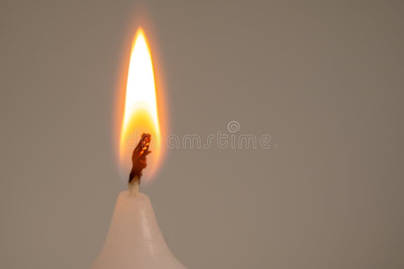 Burning candle flame. stock image. Image of consumption 257250843