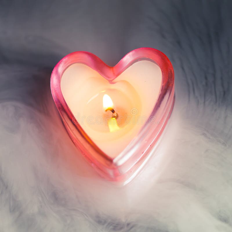 Burning candle heart stock photo. Image of single, light 34689348