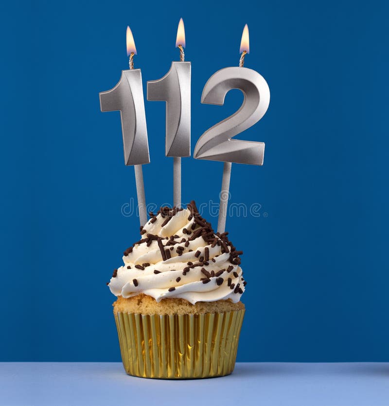 Burning Candle Number 112 - Birthday Card with Cake on Blue Background