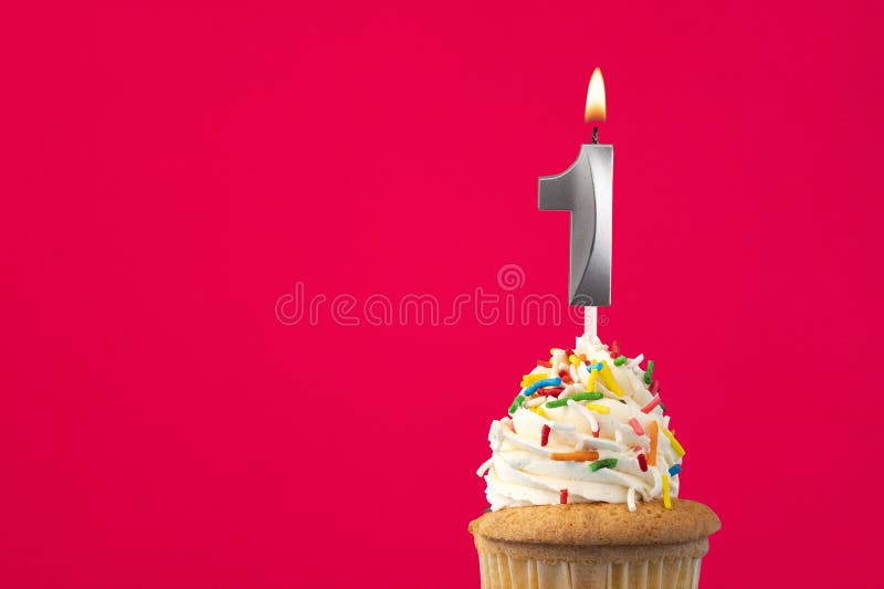 Burning candle number 1 - Birthday card with cake royalty free stock image