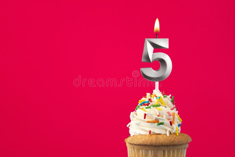 Burning candle number 5 - Birthday card with cake stock photos