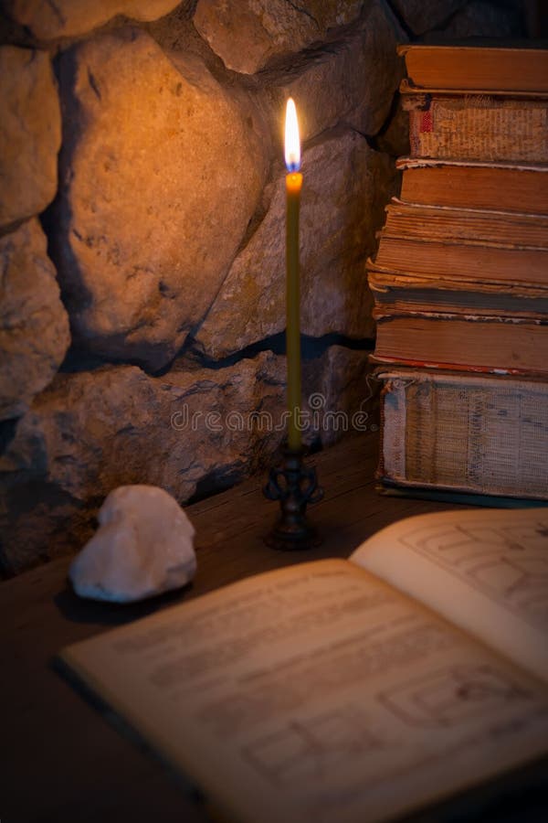 Burning Candle and Old Books Stock Photo Image of dark, fire 59308040