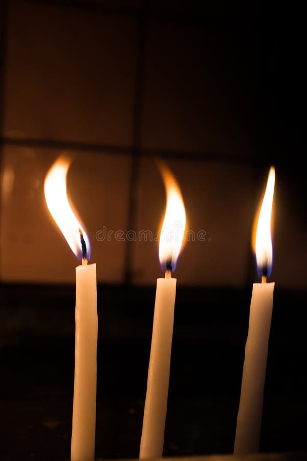 Burning Candles Give Light in the Dark Stock Photo Image of light