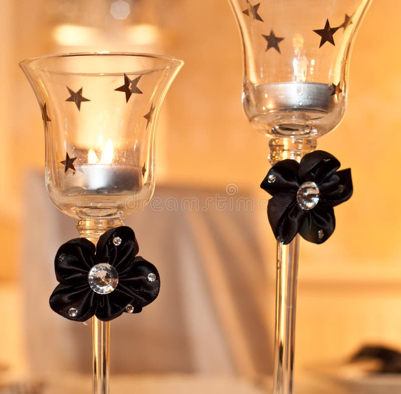 Burning candles in glass stock image. Image of flame 38329121