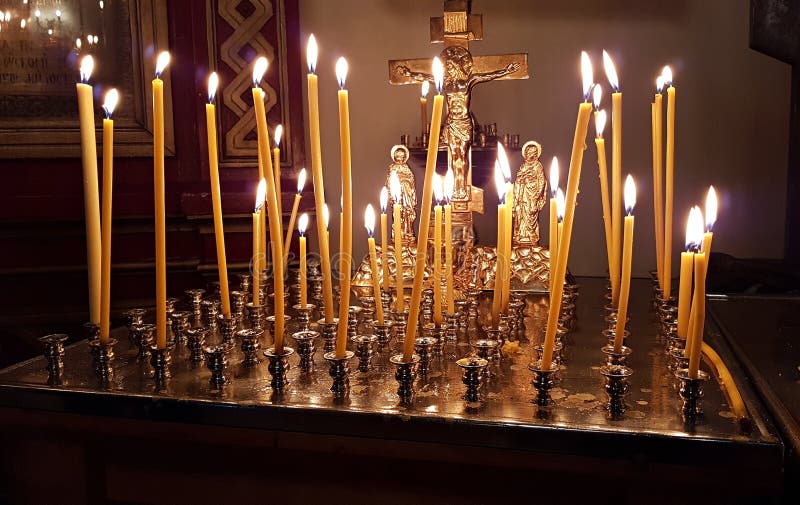 Burning candles in the Jurmala Temple of the Holy Prince Vladimir of the city. Latvia, January 2020 stock photography Burning candles in the Jurmala Temple of the Holy Prince Vladimir of the city. Latvia, January 2020 stock photography