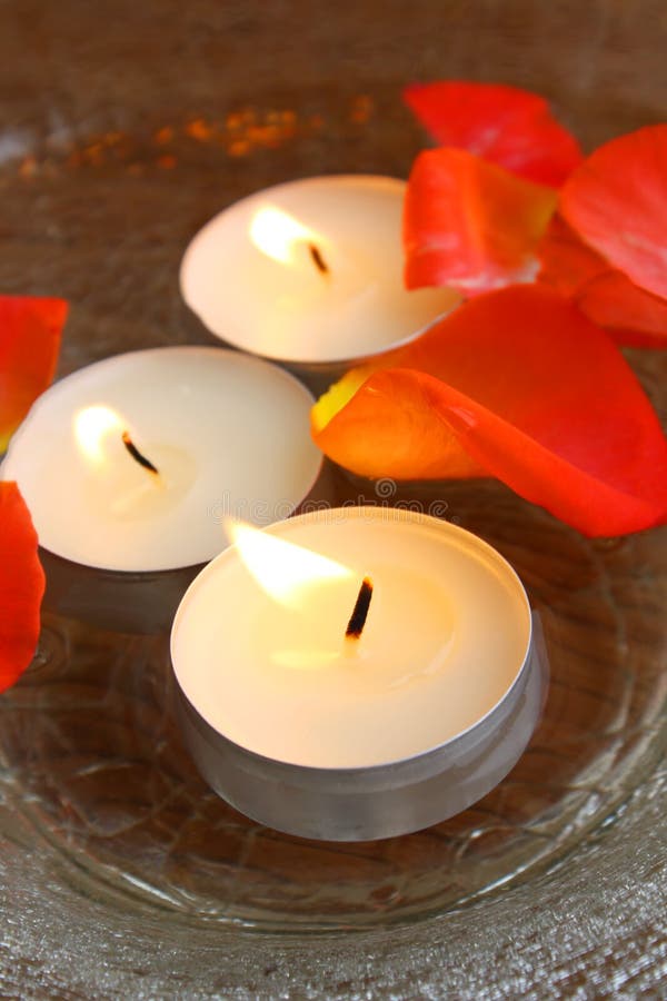 Burning Candles and Petals in Bowl Stock Photo Image of lighting, flame 11131158