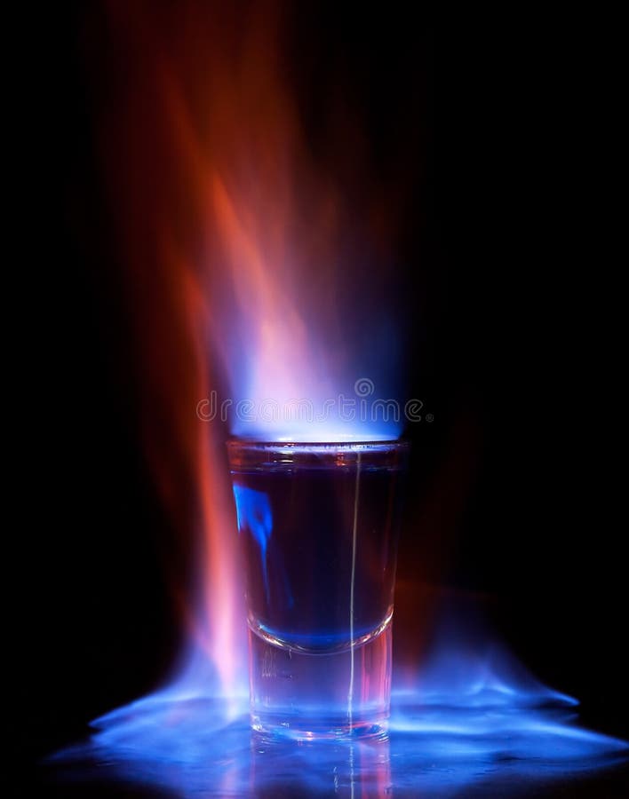 Burning drink in shot glass