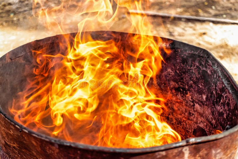 Burning Fire in a Barrel Close-up. Bright Flame. Open Flame Heating ...