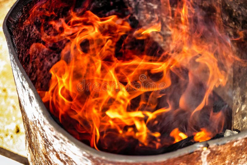 Burning Fire in a Barrel Close-up. Bright Flame. Open Flame Heating ...