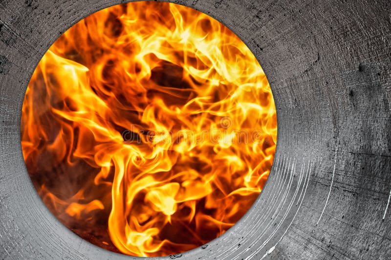 Burning Fire Close Up. Bright Orange and Red Flames on a Dark