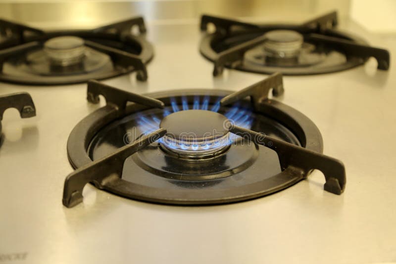 Burning Gas, Gas Stove Burner, Hob in the Kitchen Stock Photo Image