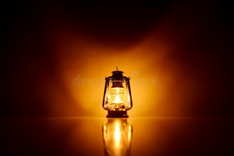 Burning kerosene lamp background