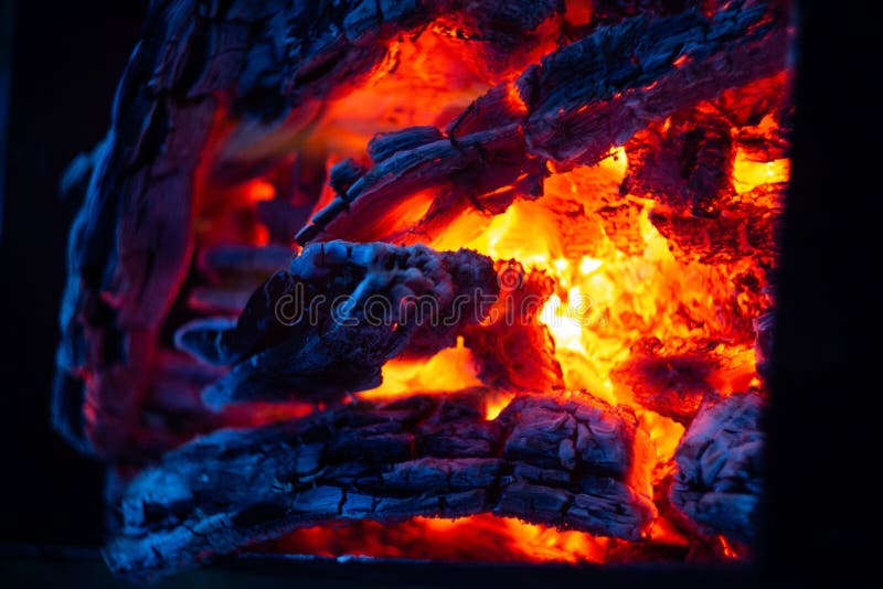 Burning logs in fireplace stock photo. Image of beautiful 142798846