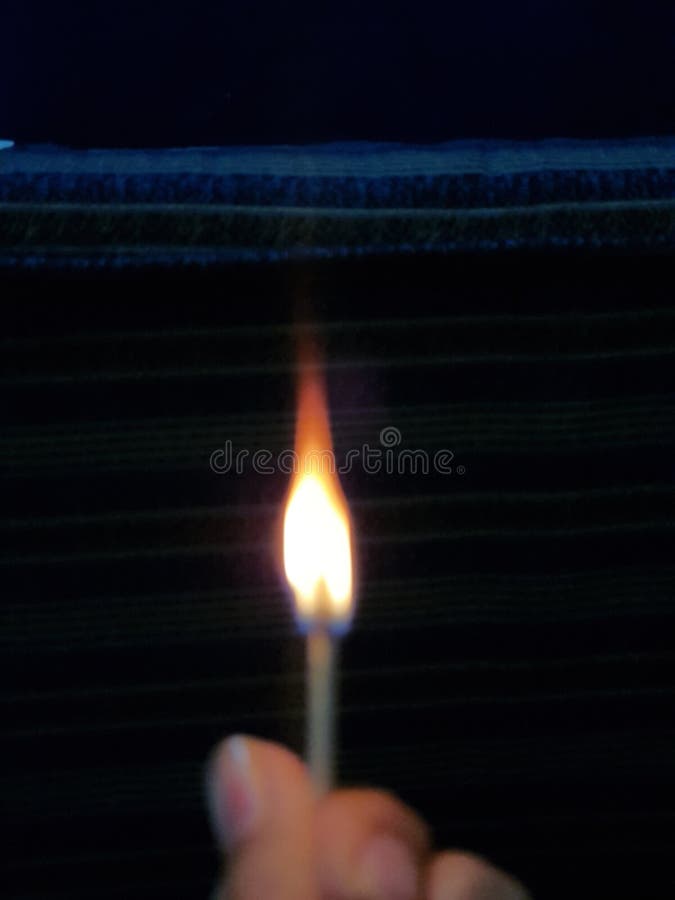 A Burning Match Stick with Fire Stock Photo Image of indoor, hand