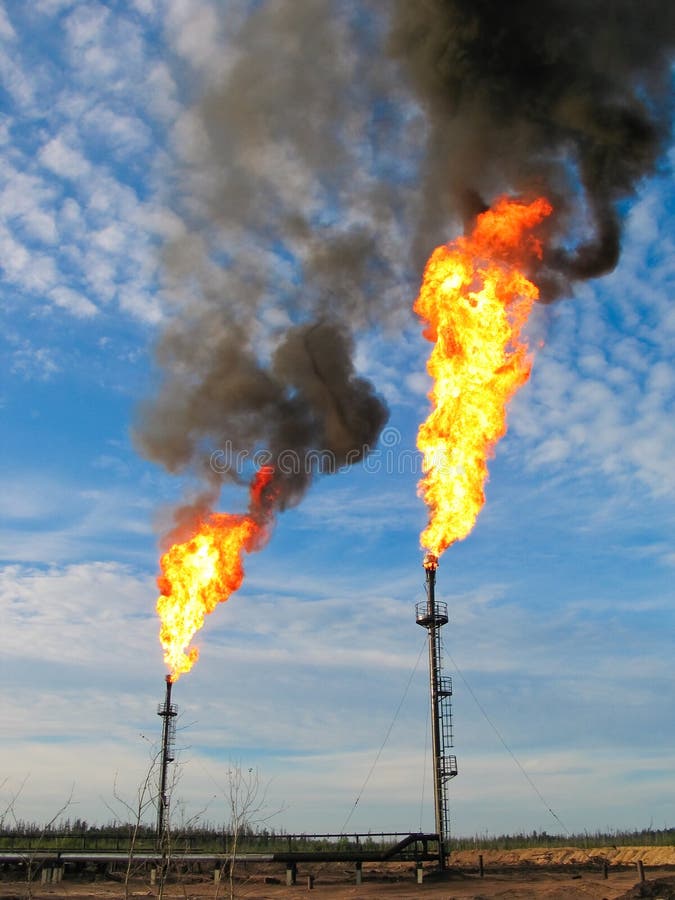 Burning oil gas flares stock image. Image of global, flaming 10072631