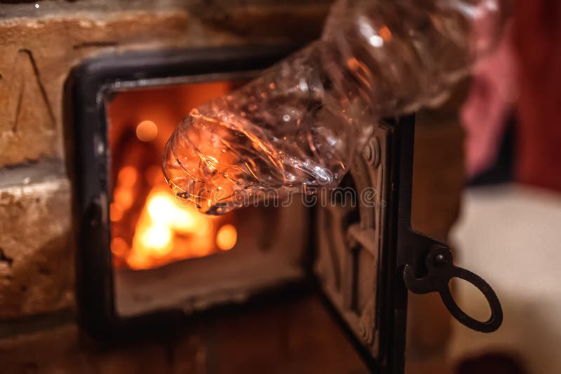 Burning Plastic Waste at Home in Fireplace Stock Photo Image of fire