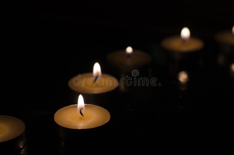 Burning Tea Candles stock photo. Image of calming, flames 99508370