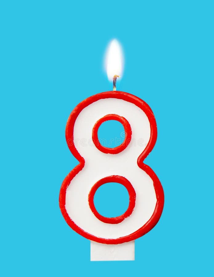 Burning Wax Candle for a Birthday Cake in the Form of Number Eight ...