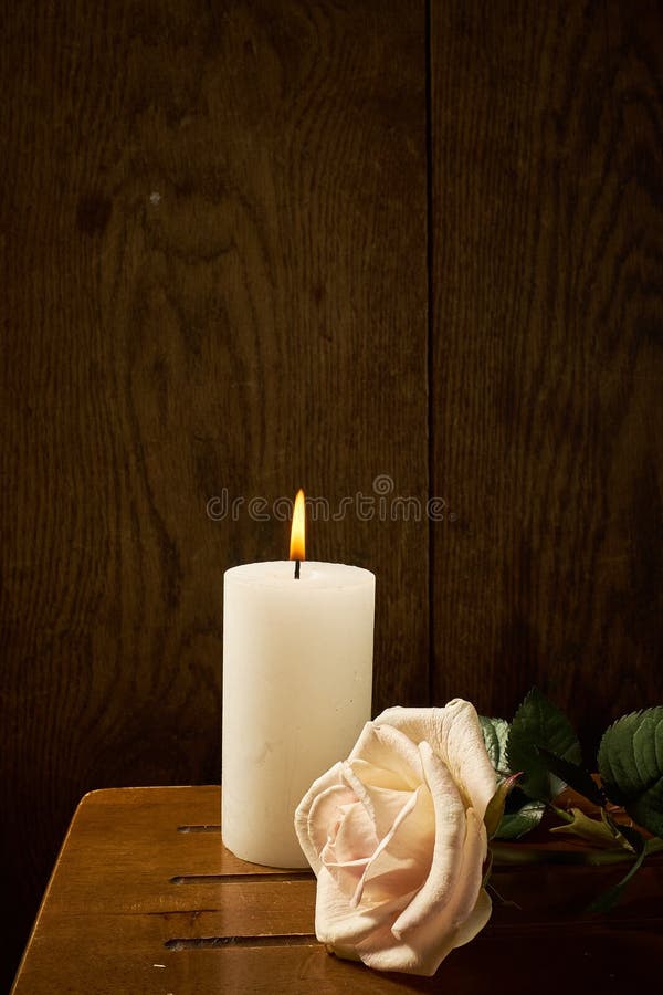 Burning Candle and a Beautiful Rose on a Dark Background Stock Photo - Image of shape, date: 164965536 Burning Candle and a Beautiful Rose on a Dark Background Stock Photo - Image of shape, date: 164965536