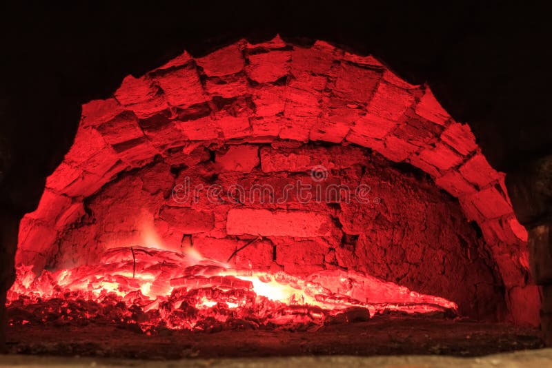 Burning wood in the hearth furnace