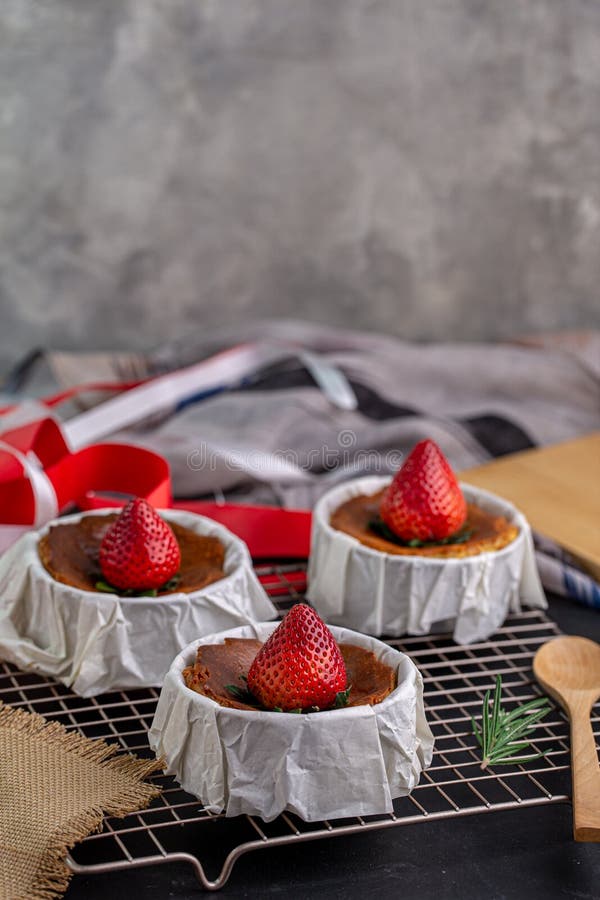 Burnt Cheese Cake, Basque Cheesecake with Strawberry Topping. Stock