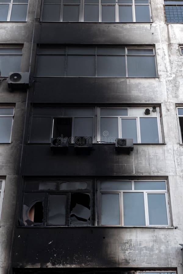 Burnt Facade of Building. Black Walls after Fire. Arson Concept Stock