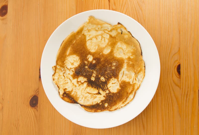 Burnt pancake stock photo. Image of plate, object, fried 28103272