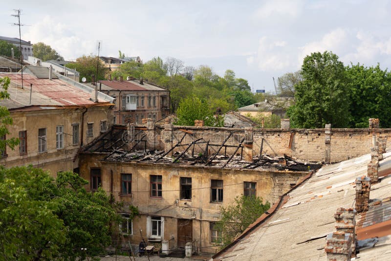 The burnt roof of the house is the result of a fire in the Old Town. Odessa. Ukraine stock images The burnt roof of the house is the result of a fire in the Old Town. Odessa. Ukraine stock images