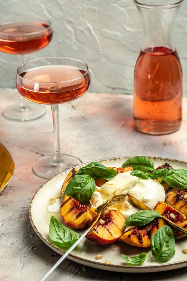 Burrata Cheese and Grilled Peaches with Rose Wine, Vertical Image. Top