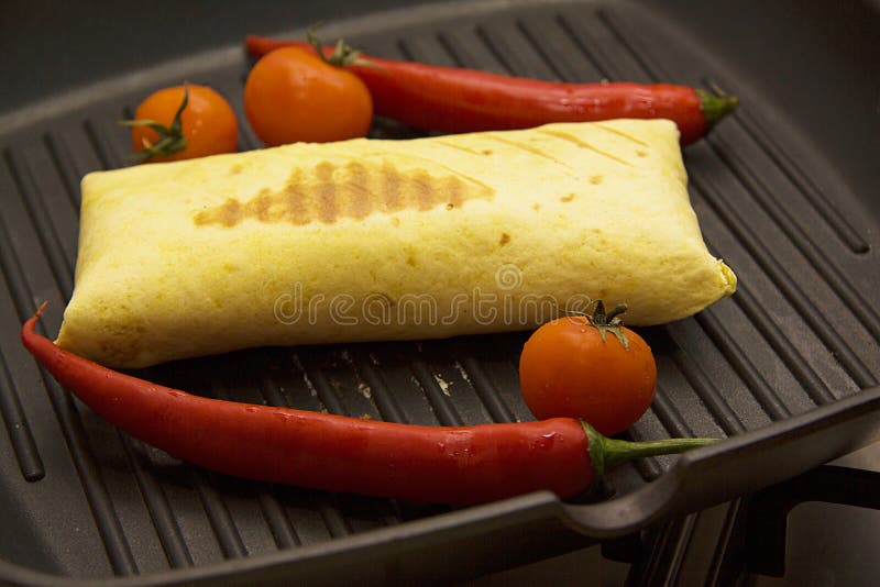 Burrito on grill stock photo. Image of lettuce, grilled 55685636
