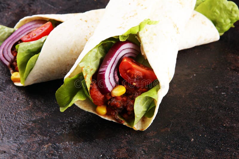 Burritos Wraps with Beef and Vegetables on Wooden Background. Be Stock ...