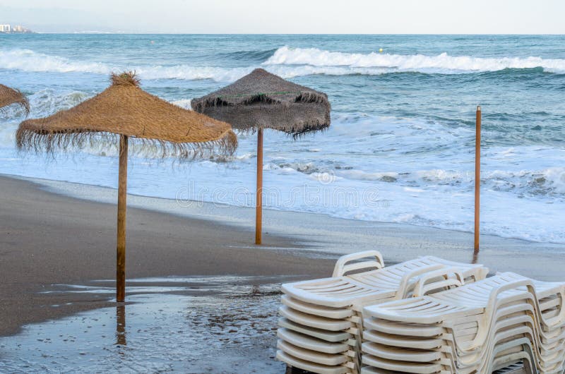 Rough seas during a storm, seen from Fuengirola beach, Costa del Sol, Andalusia, southern Spain. Rough seas during a storm, seen from Fuengirola beach, Costa del Sol, Andalusia, southern Spain