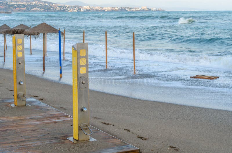 Rough seas during a storm, seen from Fuengirola beach, Costa del Sol, Andalusia, southern Spain. Rough seas during a storm, seen from Fuengirola beach, Costa del Sol, Andalusia, southern Spain