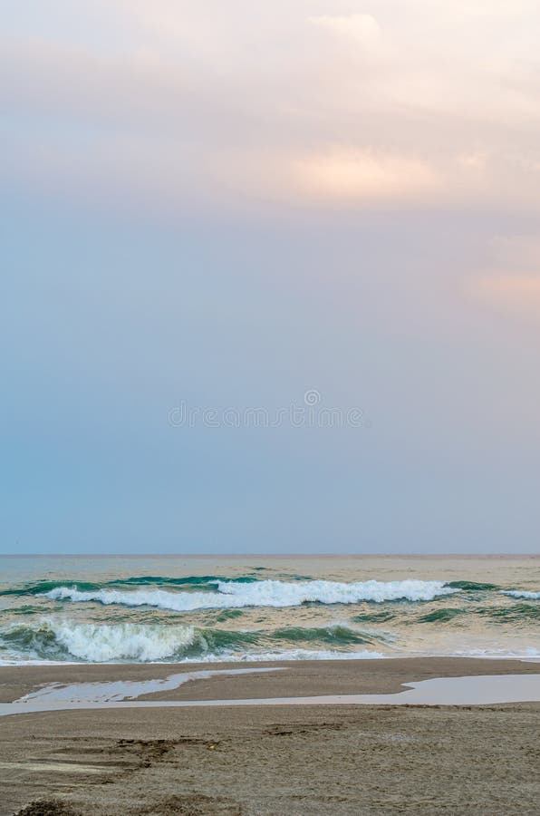 Rough seas during a storm, seen from Fuengirola beach, Costa del Sol, Andalusia, southern Spain. Rough seas during a storm, seen from Fuengirola beach, Costa del Sol, Andalusia, southern Spain