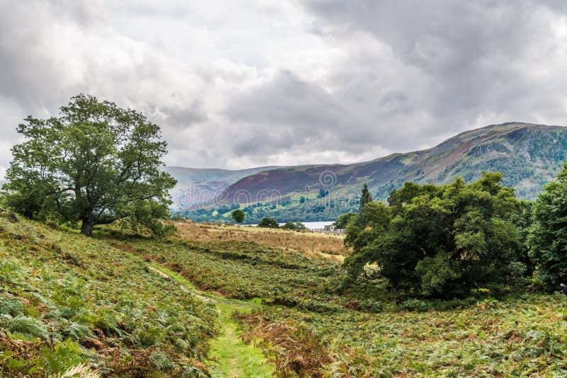 Burzowy Ullswater i Bampton błonie zdjęcia stock Burzowy Ullswater i Bampton błonie zdjęcia stock