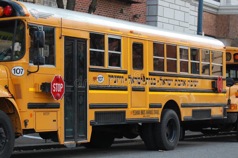 A school bus with Hebrew lettering for one of the Jewish schools in New York City, where people of many traditions live together. A school bus with Hebrew lettering for one of the Jewish schools in New York City, where people of many traditions live together.