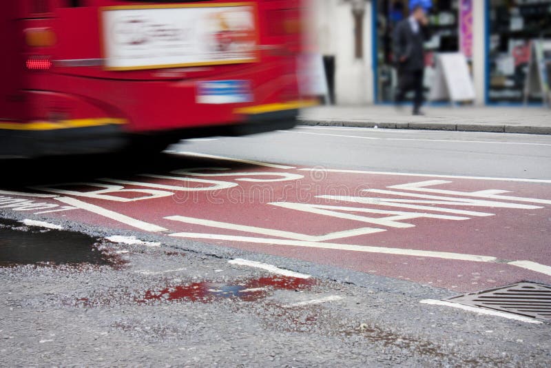Bus lane in london stock image. Image of words, markings 13822895