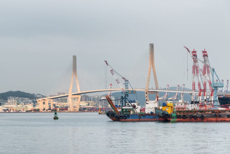 Busan Harbor Bridge and the Port of Busan. South Korea