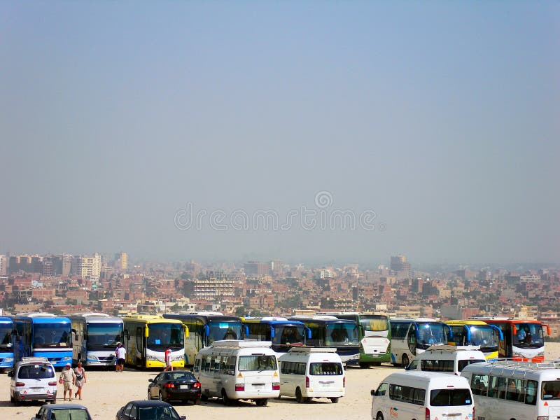Buses - waiting for tourists near the Great Pyramid of Giza in Cairo, Egypt stock image Buses - waiting for tourists near the Great Pyramid of Giza in Cairo, Egypt stock image
