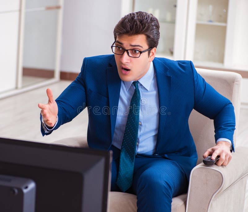 Businesman Watching Tv in Office Stock Photo Image of house, manager