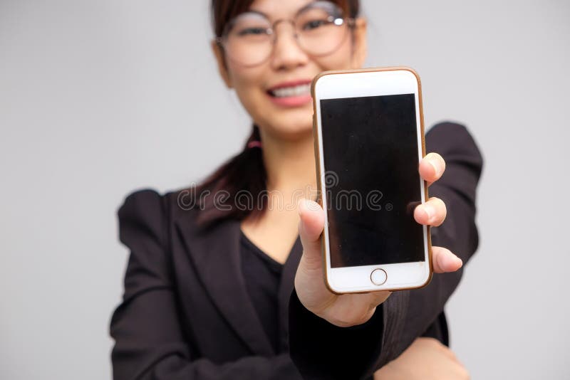 Business asian glasses women use cellphone