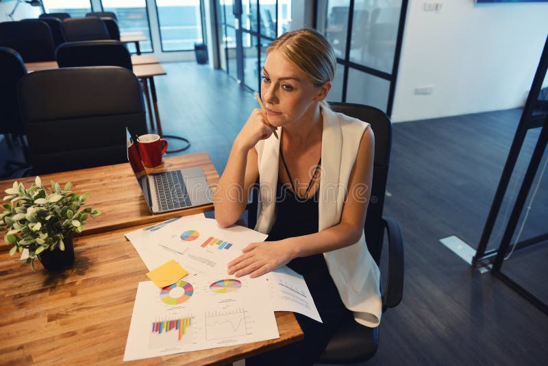 Business blonde girl thinking about work royalty free stock image Business blonde girl thinking about work royalty free stock image