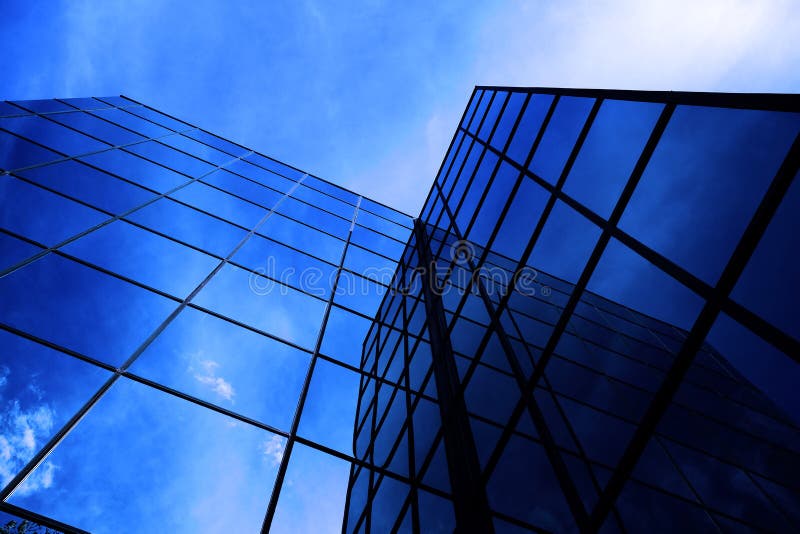 Business Building Highrise Mirrored Windows with Sky and Clouds