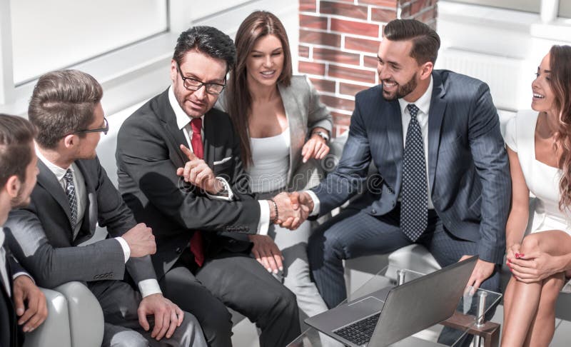 Business colleagues greet each other at an informal meeting royalty free stock photos Business colleagues greet each other at an informal meeting royalty free stock photos