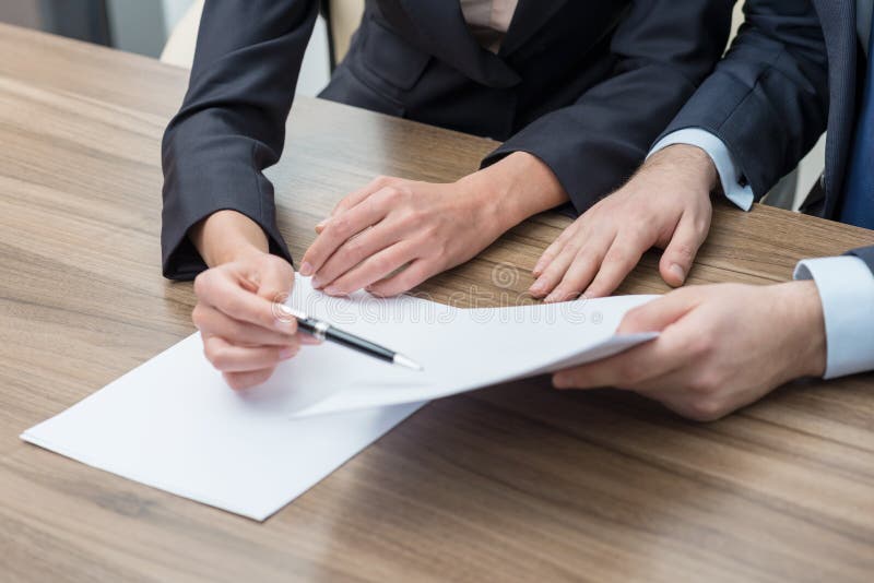 Business colleagues are working on the papers. stock photo Business colleagues are working on the papers. stock photo