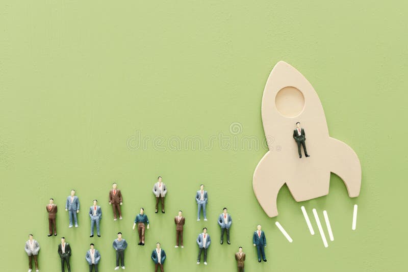 Business concept of leadership and teamwork. A group of people on a rocket gain an advantage over the others stock photos